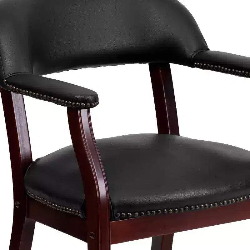 Fauteuil de conférence avec garniture cloutée et roulettes