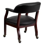 Fauteuil de conférence avec garniture cloutée et roulettes