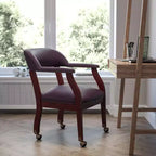 Fauteuil de conférence avec garniture cloutée et roulettes