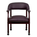 Fauteuil de conférence avec garniture cloutée et roulettes