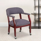 Fauteuil de conférence avec garniture cloutée et roulettes