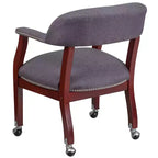 Fauteuil de conférence avec garniture cloutée et roulettes