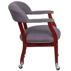 Fauteuil de conférence avec garniture cloutée et roulettes