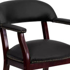 Fauteuil de conférence avec garniture cloutée et roulettes