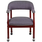 Fauteuil de conférence avec garniture cloutée et roulettes