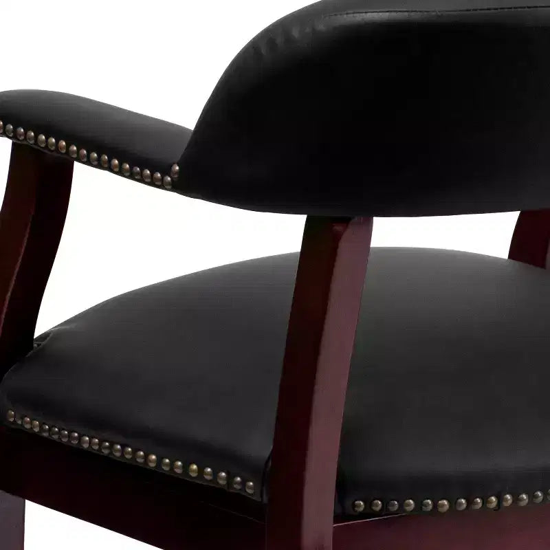 Fauteuil de conférence avec garniture cloutée et roulettes