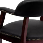 Fauteuil de conférence avec garniture cloutée et roulettes