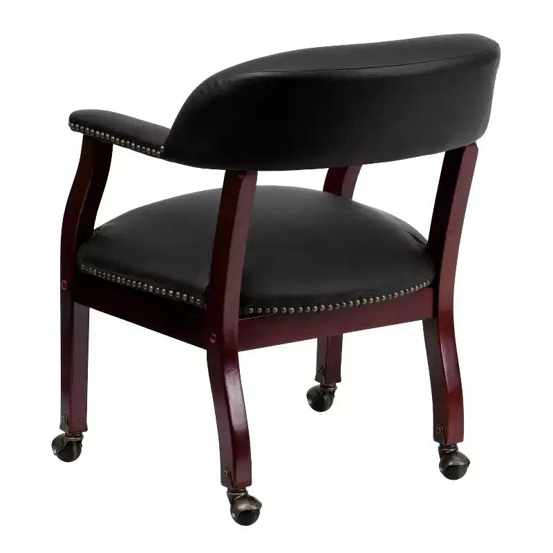 Fauteuil de conférence avec garniture cloutée et roulettes