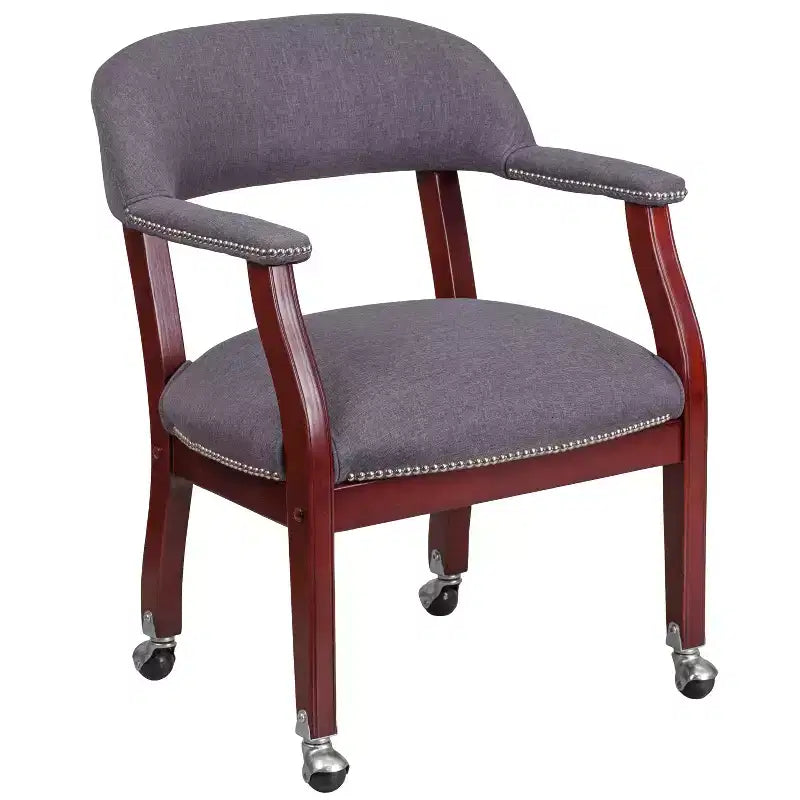 Fauteuil de conférence avec garniture cloutée et roulettes